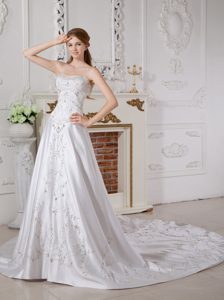 Breathtaking A-line Sweetheart Court Train Satin Dress for Brides with Appliques
