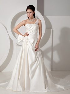 Poised A-line One Shoulder Bow Court Train Satin Wedding Dress with Appliques