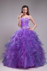 Romantic Appliqued Lavender Quinceanera Dress with Beading and Ruffles