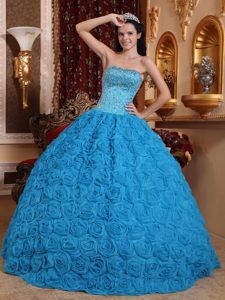 Blue Ball Gown Strapless with Beaded Quinceanera Dress with Rolling Flowers