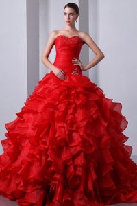 Sweetheart Brush Train Red Ruched Appliqued Quinceanera Dress with Ruffles