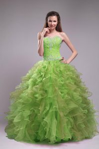 Sweetheart Yellow Green Ruched Quinceanera Dress with Ruffles and Beading