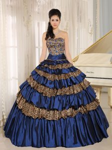 Navy Blue Leopard Beaded Quinceanera Dress with Ruffled Layers and Appliques